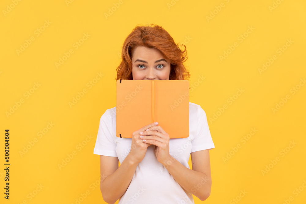 positive girl hold planner on yellow background, school positive girl hold planner on yellow background, school