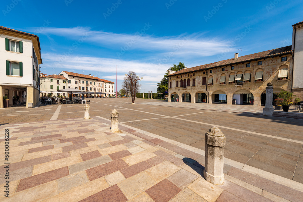 Main town square in Oderzo called Piazza Grande (large square). Small town of Roman and Medieval origins in the province of Treviso, Veneto, Italy, Europe.