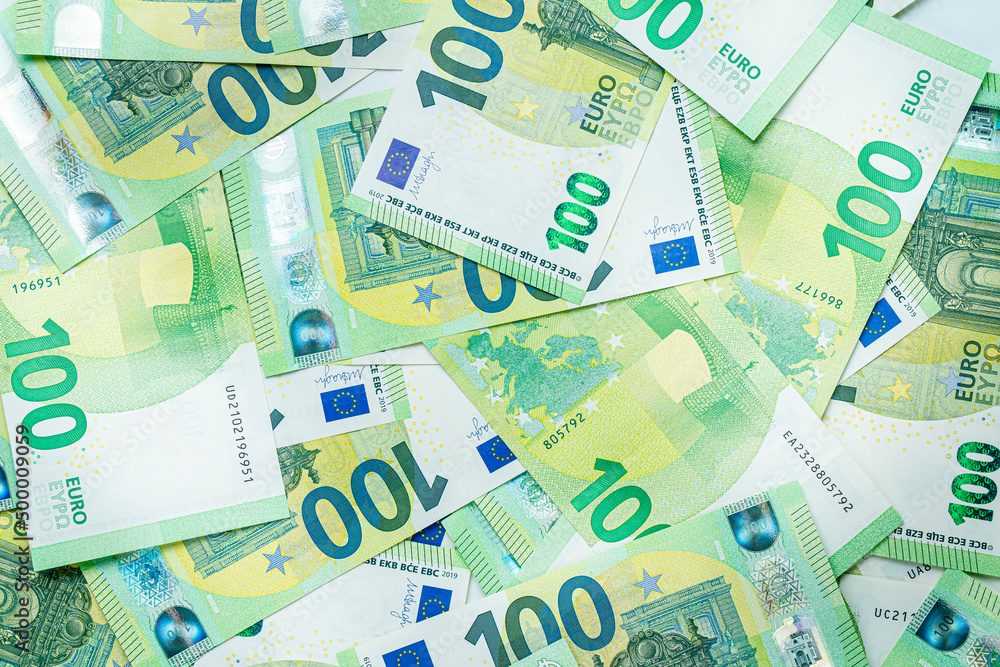 Obraz premium Background of one hundred euro bills. Top view, flat lay.