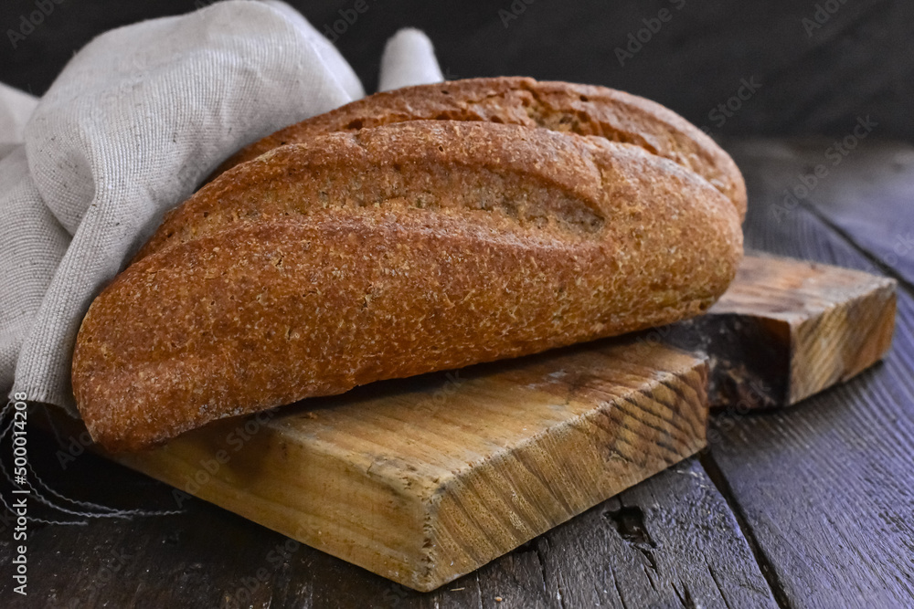 Bread on wooden background