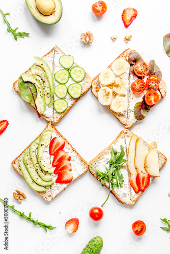 fitness breskfast with homemade sandwiches white table background top view photo