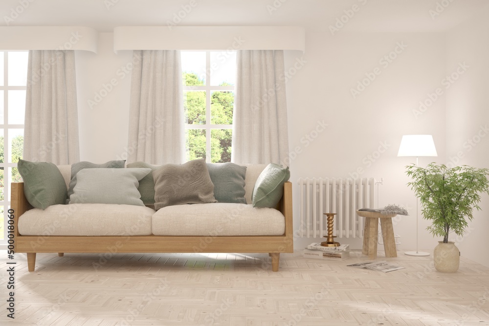Fototapeta premium White living room with sofa and summer landscape in window. Scandinavian interior design. 3D illustration