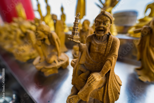 Bangkok, Thailand - March, 04, 2022 : Golden Buddha statue in Leng Noei Yi 2 or Mangkon Temple in Bangkok, Thailand. © bubbers