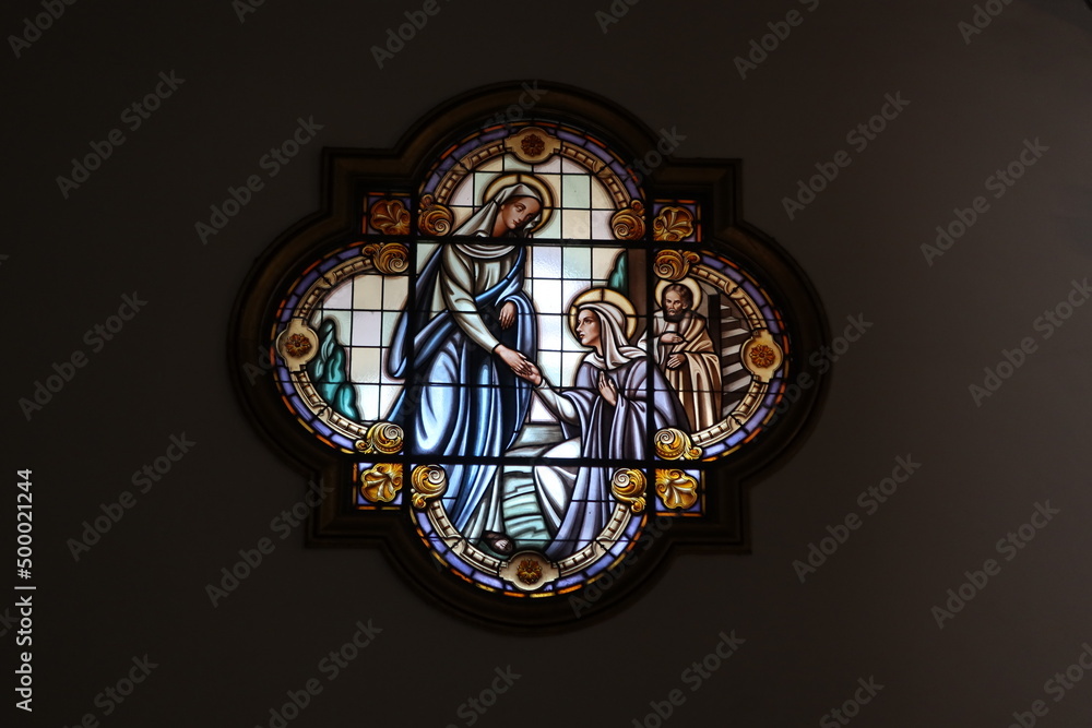 Candelaria, Tenerife, Canary Islands, Spain, March 8, 2022: Stained-glass windows with the image of the Virgin Mary in the Basilica of Candelaria in Tenerife. Spain