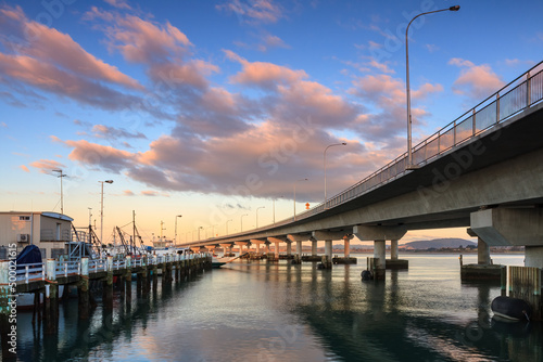 The Tauranga Harbour Bridge, Tauranga, New Zealand, at sunset  photo