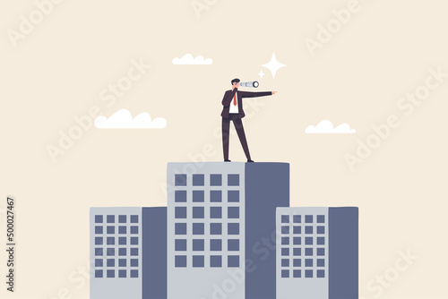 Leadership vision, company growth. The future direction of the organization..A businessman stands with binoculars on top of a tall building.