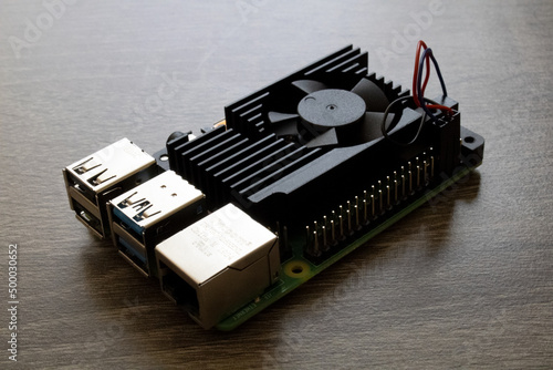 Micro-computer set with black heatsink for electrical engineering on table photo