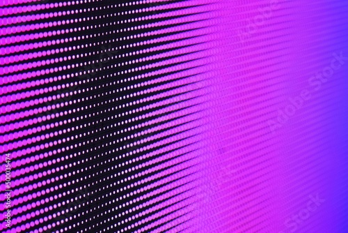 Close-up of Led screen surface video wall screen with glowing dot lights background