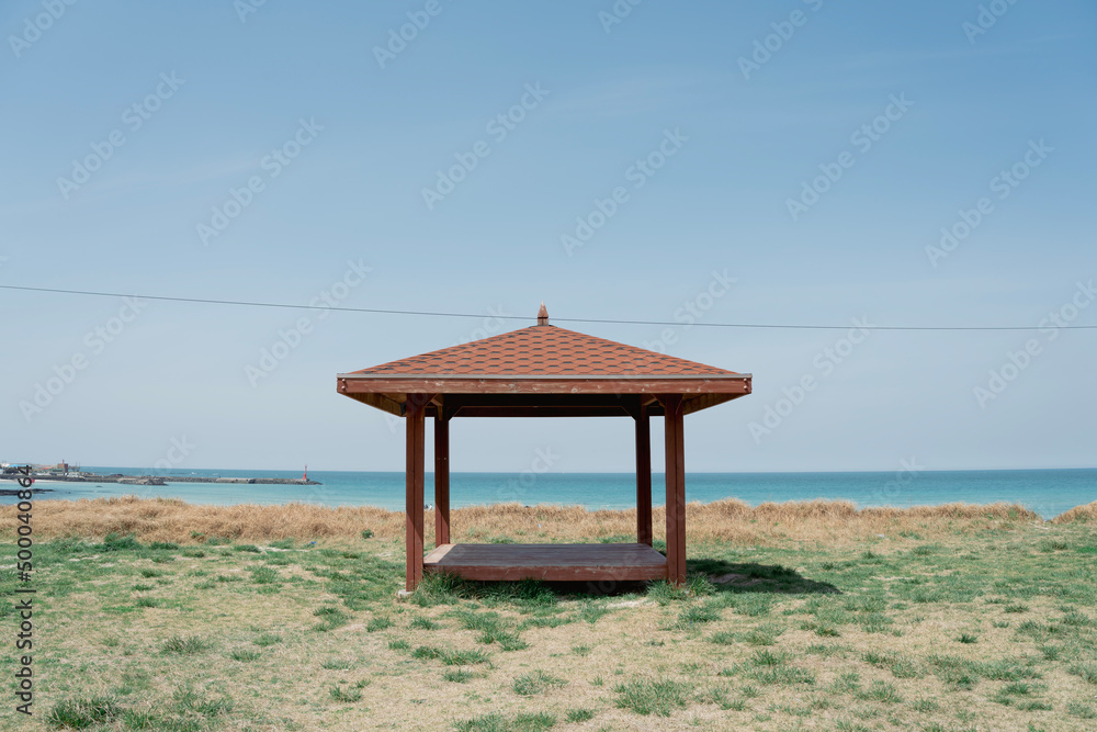 Gimnyeong beach and gazebo in Jeju island, Korea Gimnyeong beach and gazebo in Jeju island, Korea