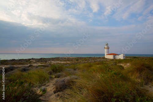 Polente Lighthouse is located at the westernmost edge of Bozcaada and was built in 1861. Polente light is 32 meters high and can send its light up to 15 nautical miles or 28 kilometers. photo