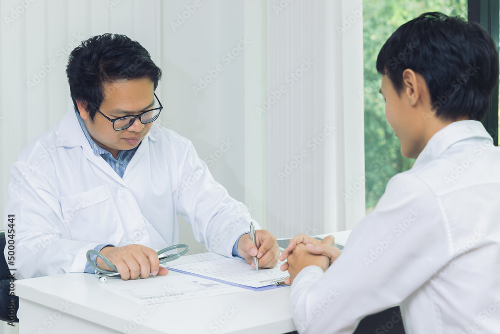 A doctor consulting and explain patient health check in office. Medicine and health care concept. A doctor consulting and explain patient health check in office. Medicine and health care concept.