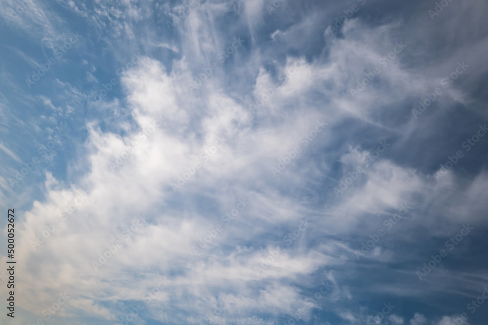 Fototapeta premium Blue sky background with white striped clouds. blue sky panorama may use for sky replacement
