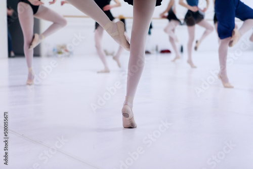 Close up of classic ballet dancers feet's dancing during a lesson