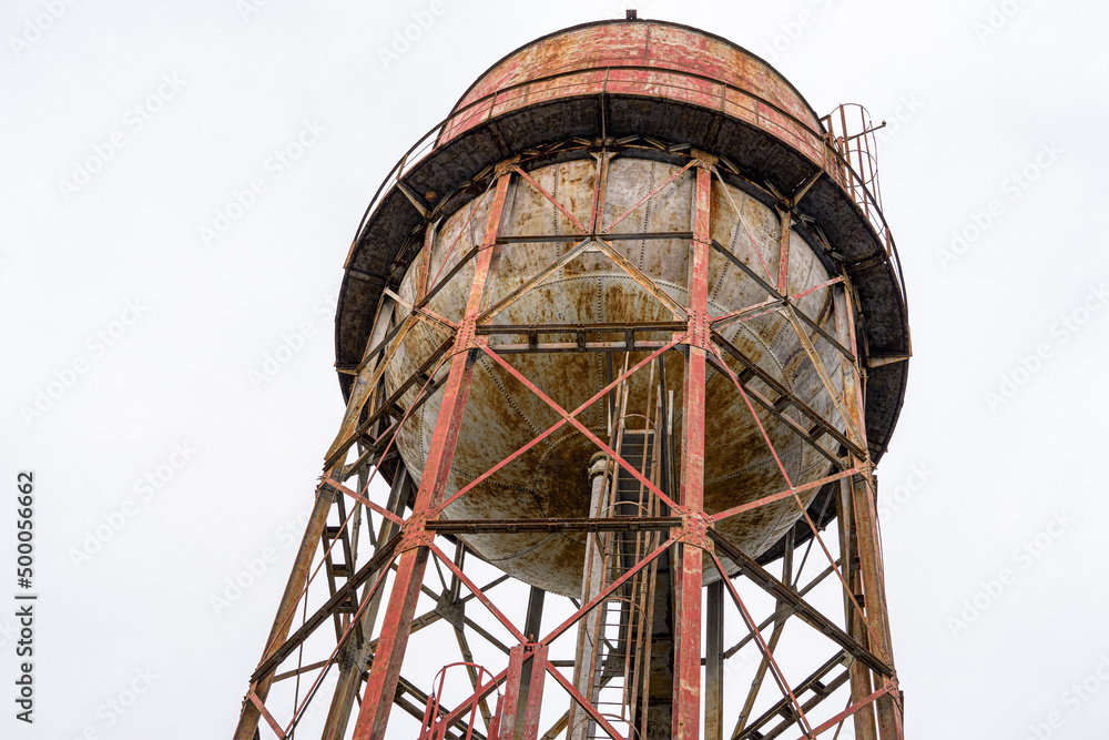 Close-up of an old abandoned city water tower