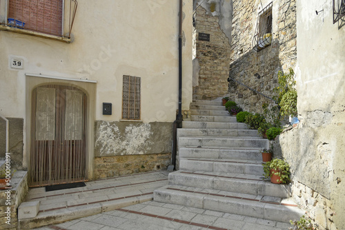 Narrow street in San Bartolomeo in Galdo, a village in the province of Benevento in Italy photo
