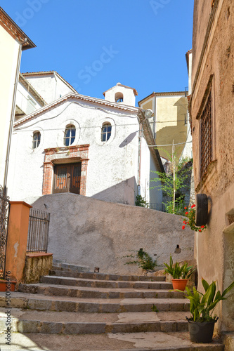 Vertical shot of a narrow street in Rivello, a village in the Basilicata region in Italy photo