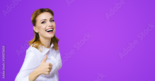 Tablou pe pânză Excited happy smiling businesswoman, showing thumb finger up or like hand sign gesture