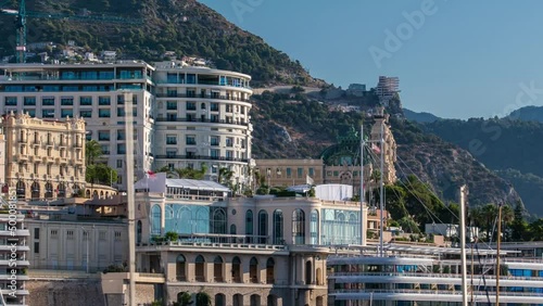 Monte Carlo Port Hercule panorama timelapse. View of luxury yachts and casino of Monaco, Cote d'Azur. photo