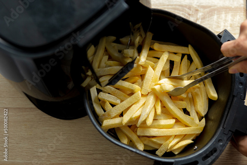  French fries are about to be fried in an oil-free fryer.