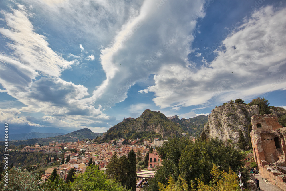 Panorama of the touristic city of Taormina, located in eastern Sicily. Panorama of the touristic city of Taormina, located in eastern Sicily.