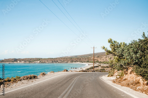 Landscape with road, hills and seashore Crete, Greece.