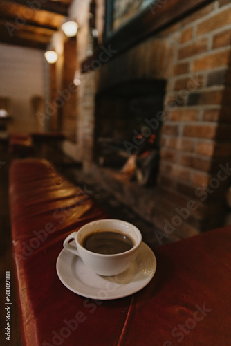 Slika na platnu Coffee by the fireside