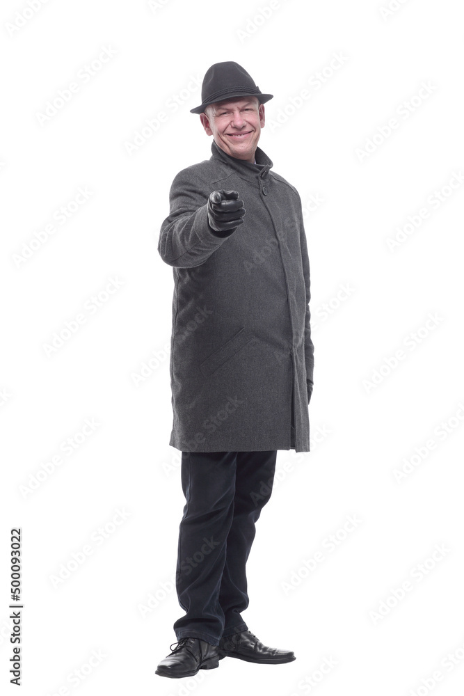 intelligent man in a hat and autumn coat. isolated on a white background. intelligent man in a hat and autumn coat. isolated on a white background.