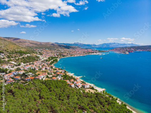 Fototapeta Naklejka Na Ścianę i Meble -  Croatia. Summer. Tourist season. Sunny day. Coast of the Adriatic Sea. Small town by the sea. Drone. Aerial view