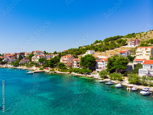 Fototapeta Naklejka Na Ścianę i Meble -  Croatia. Summer. Sunny day. Coast of the Adriatic Sea. Small town by the sea. Holiday season. Popular tourist spot