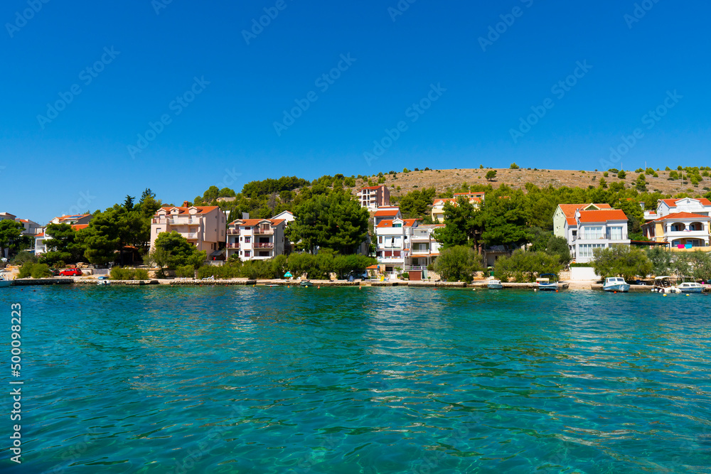 Croatia. Summer. Sunny day. Coast of the Adriatic Sea. Small town by the sea. Holiday season. Popular tourist spot