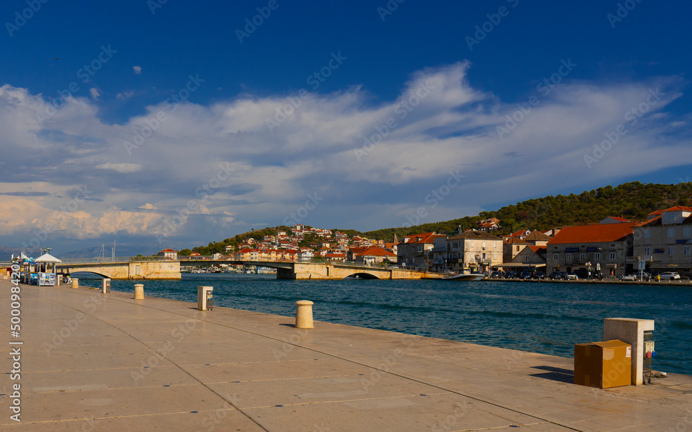Croatia. City of Trogir. Sunny day. Embankment street on the navigable canal