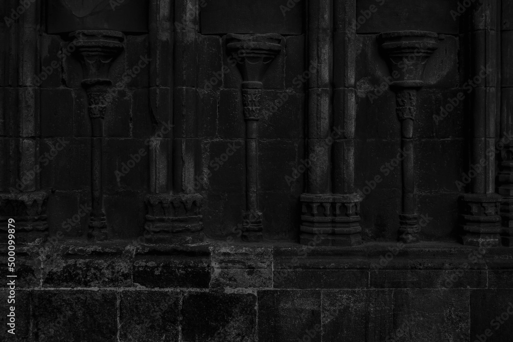 Obraz premium Old black ancient wall. Dark background