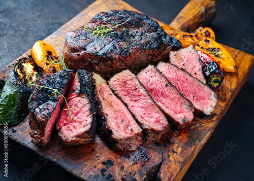 Traditional barbecue dry aged wagyu rib-eye beef steaks served with paprika and Fototapet