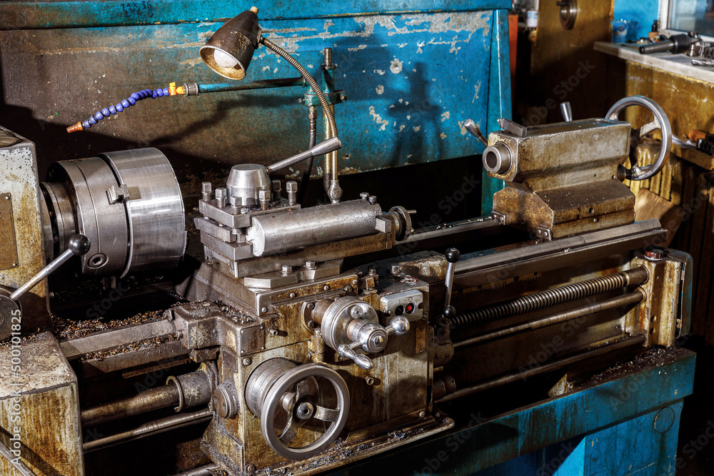 Metal processing machine. Detail of a tool in production