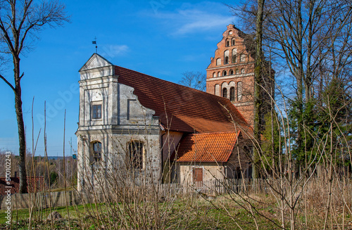 General view and architectural details of the temple built in the years 1693-1695, the Evangelical Augsburg Church of the Republic of Poland in Dzwierzuty in Masuria, Poland.