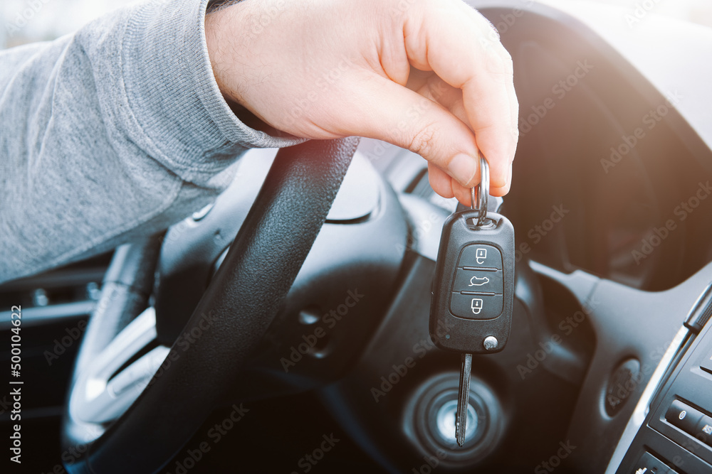 Man showing his new car key. Buying or rent a car. Man showing his new car key. Buying or rent a car.