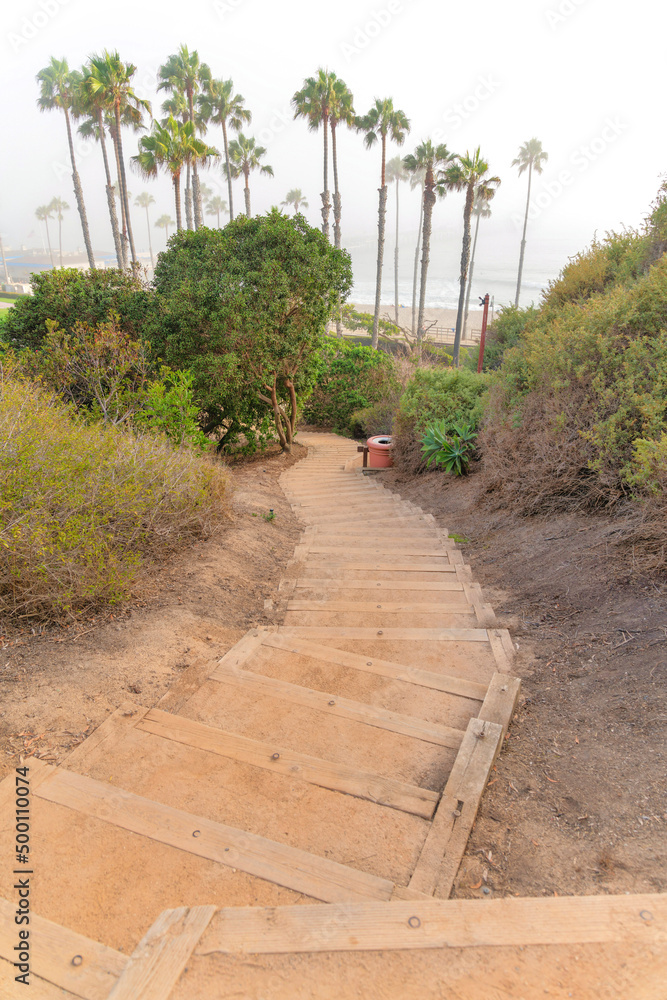 Stairs to the beach with wood steps at San Clemente, California Stairs to the beach with wood steps at San Clemente, California