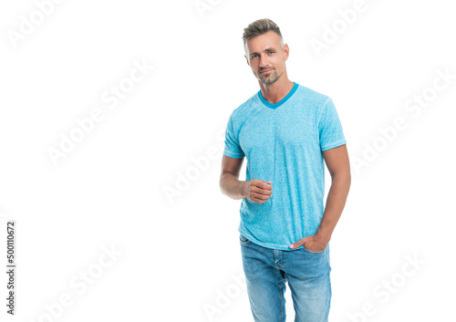 Happy caucasian guy in casual style pretend holding imaginary product in hand