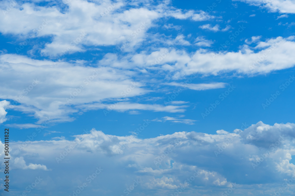 bright blue sky with clouds as abstract background bright blue sky with clouds as abstract background