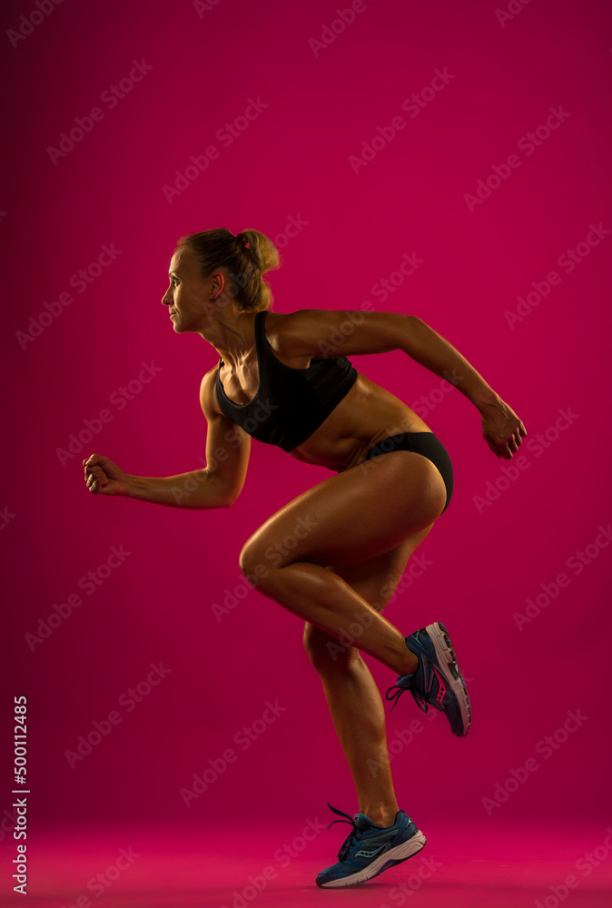 Fitness young woman in sports wear doing workout fitness aerobic exercise