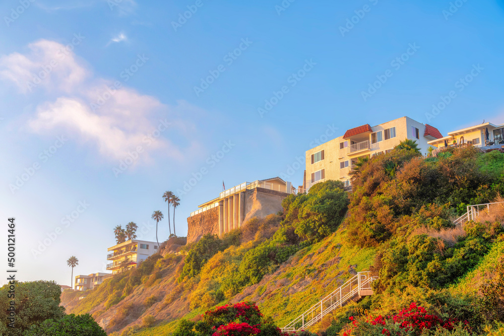 Apartment buildings in a low angle view on top of a mountain slope at San Clemente, California