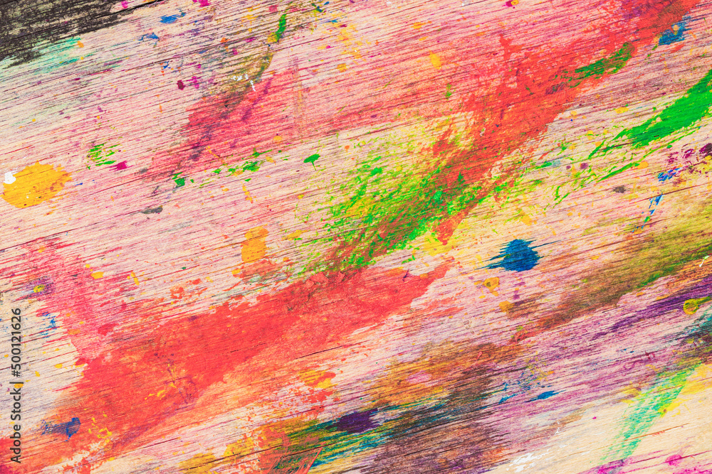 Old Dirty Wood Background with splashes of paint. Colorful grunge texture