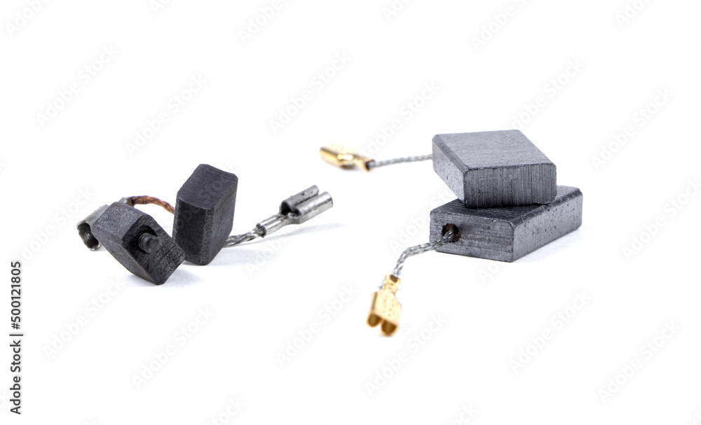 New and old carbon brushes isolated on a white background. Brushes for electric motor.Spare parts for angle grinders.Graphite brushes New and old carbon brushes isolated on a white background. Brushes for electric motor.Spare parts for angle grinders.Graphite brushes