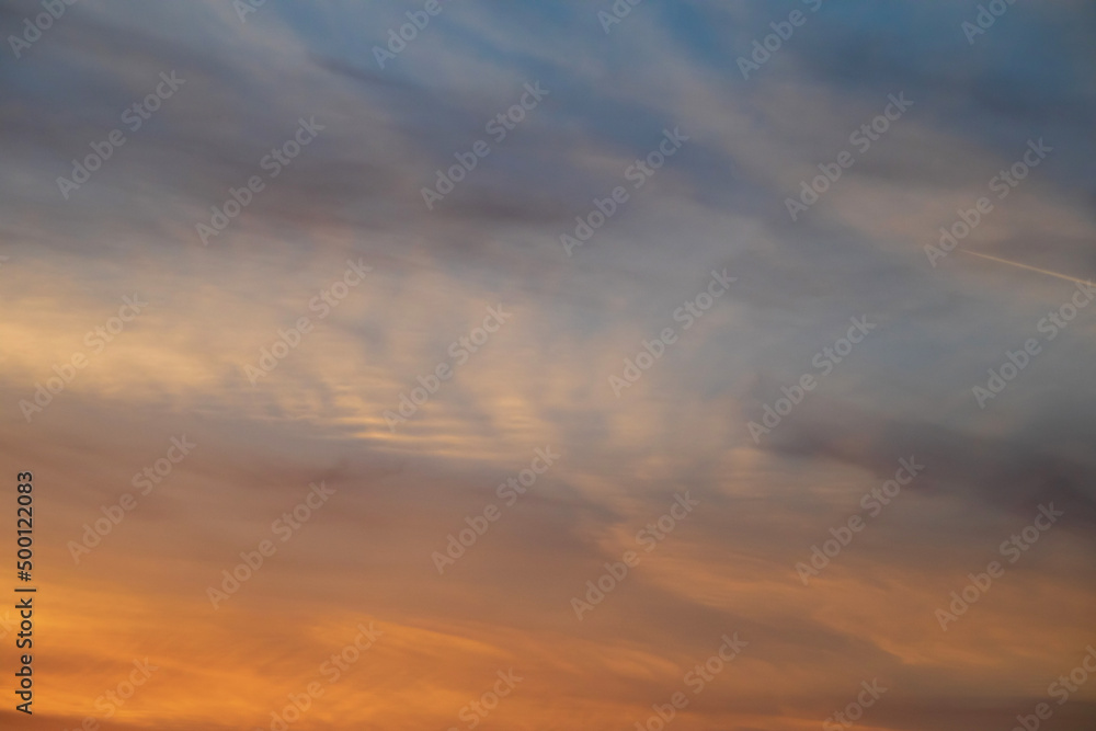 Sky background at sunset. Yellow clouds and blue sky Sky background at sunset. Yellow clouds and blue sky