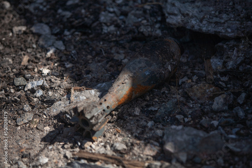 Fragments of broken mines on the ground