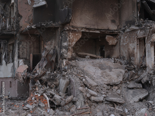 War in Ukraine, ruined building after bombing, close up photo