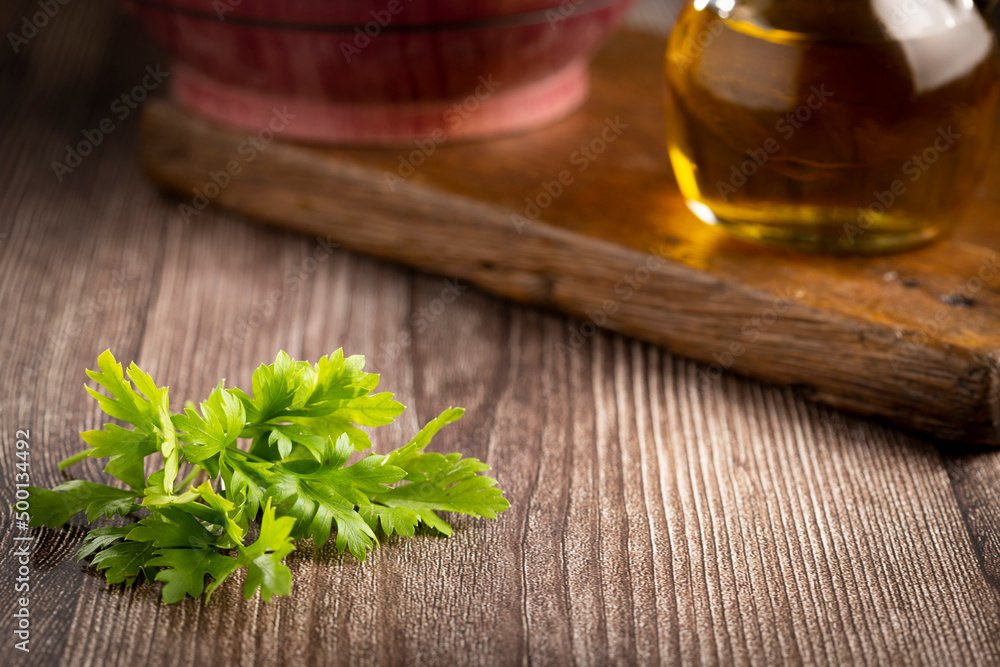 Fresh italian parsley on the table. Green parsley. Fresh italian parsley on the table. Green parsley.