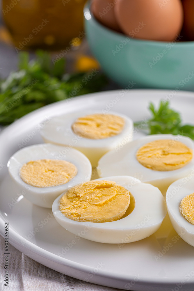Sliced ​​boiled eggs on the table.
