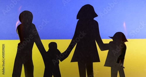 War In Ukraine. Family Silhouette Father, Mother, Two Children. Concept, destruction, burning photo