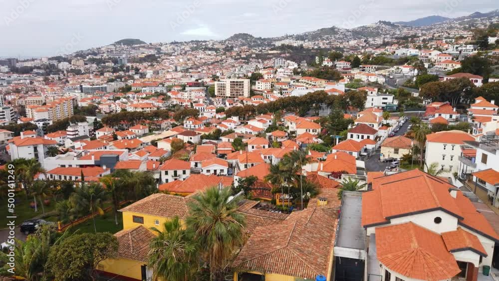 View from the cable car in Funchal. flying over buildings. View from the cable car in Funchal. flying over buildings.